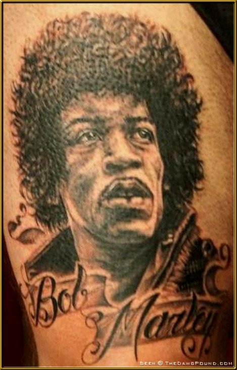 Tagged as Bob Marley body modification face tattoo 